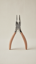 Hair Made Easi Micro Ring Applicator Pliers, Hero angle is a 3/4 top-down perspective that highlights tool contours and...
